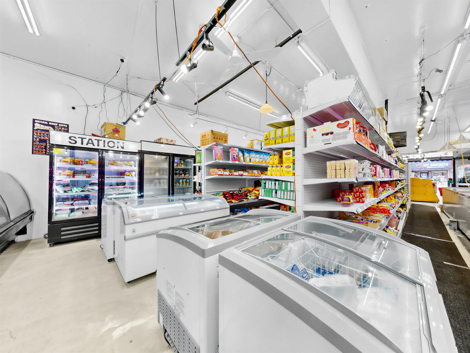 Freezers and shelving in the middle of the floor