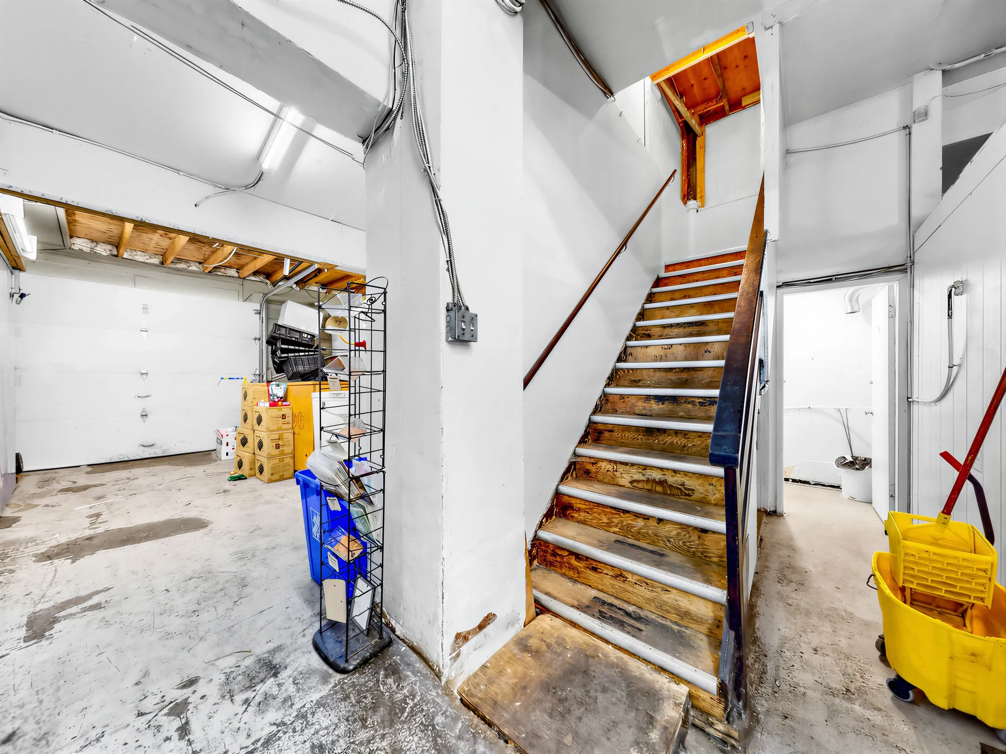 Timber stair from the back of house up to the upper level