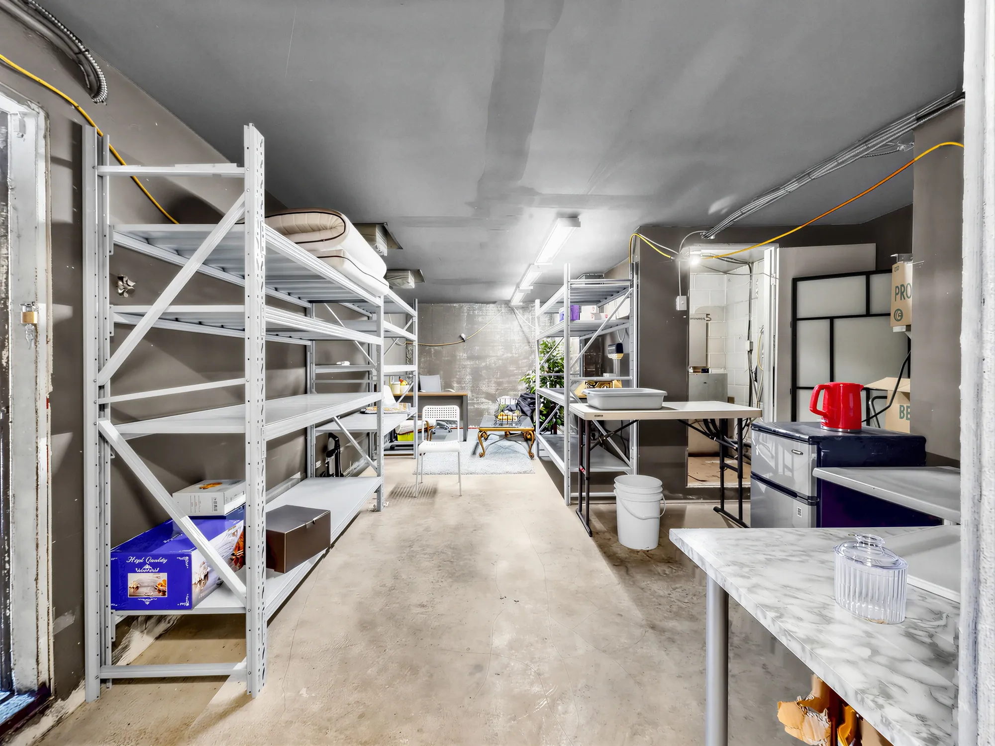 Dry storage room with steel racking either side